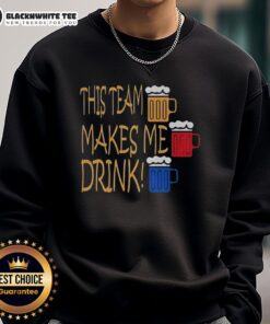 Cozy sweatshirt featuring 'This Team Makes Me Drink' for Pittsburgh Steelers fans, perfect for game day attire.