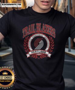 Alt Text: Retro Portland Trail Blazers NBA logo T-shirt featuring a laurel wreath frame design, perfect for fans and collectors.
