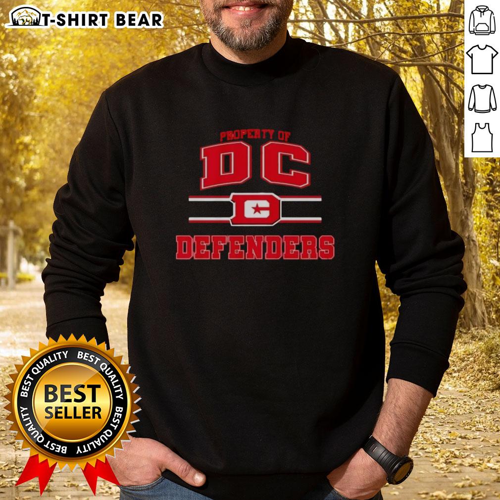 Top Property Of Dc Defenders Ufl Logo Sweatshirt Alt Text: Stylish DC Defenders UFL logo sweatshirt featuring bold colors, perfect for fans and casual wear enthusiasts.