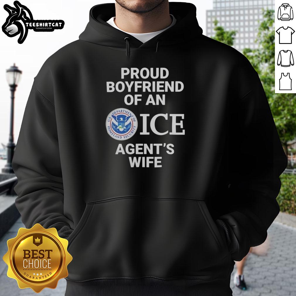top-proud-boyfriend-of-an-ice-agents-wife-hoodie Top Proud Boyfriend of an Ice Agent's Wife Hoodie worn by a smiling man in a casual setting, showcasing stylish design.