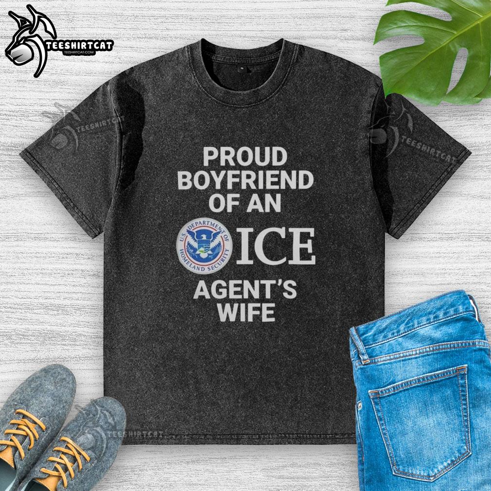 top-proud-boyfriend-of-an-ice-agents-wife-washed-t-shirt Alt Text: Proud boyfriend wearing a washed T-shirt, celebrating his relationship with an ICE agent's wife in a candid moment.