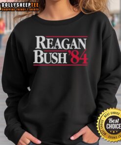 Alt Text: Vintage Top Ronald Reagan and Bush 1984 sweatshirt featuring iconic campaign graphics and presidential portraits.