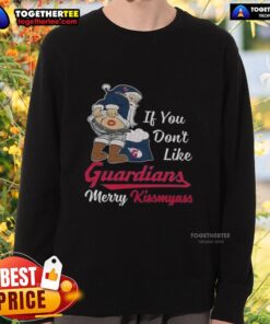 Funny Christmas sweatshirt featuring Santa Claus and 'If You Don't Like Cleveland Guardians, Merry Kiss My Ass' slogan.