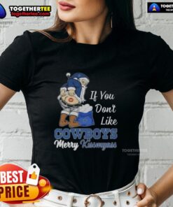 Top Santa Claus graphic on a Merry Kiss My Ass ladies tee for Dallas Cowboys fans, perfect for holiday cheer.