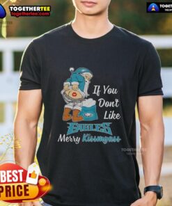 Top Santa Claus graphic on a 'Merry Kissmyass' T-shirt for Philadelphia Eagles fans who want to show their spirit.