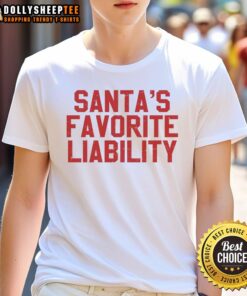 Funny political Christmas T-shirt featuring Santa with the phrase 'Top Santa's Favorite Liability' in festive colors.
