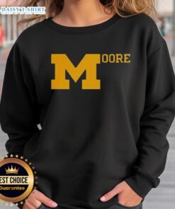 Top Sherrone Moore Michigan Football sweatshirt featuring bold team colors and logo, perfect for fans and game day wear.