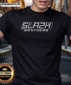 Alt Text: Top Slash Brothers San Antonio Spurs T-Shirt featuring bold team logo and vibrant colors for fans.