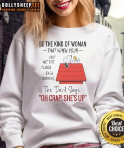 Cozy sweatshirt featuring Snoopy with the phrase 'Be the kind of woman' for daily motivation and style.