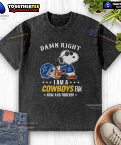 Alt Text: Top Snoopy football graphic on a washed t-shirt, proudly declaring 'Damn Right I Am A Cowboys Fan Now And Forever.'