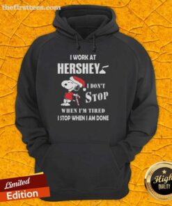 Alt Text: Snoopy Christmas hoodie with 'I Work At Hershey I Dont Stop When Im Tired I Stop When I Am Done' design.