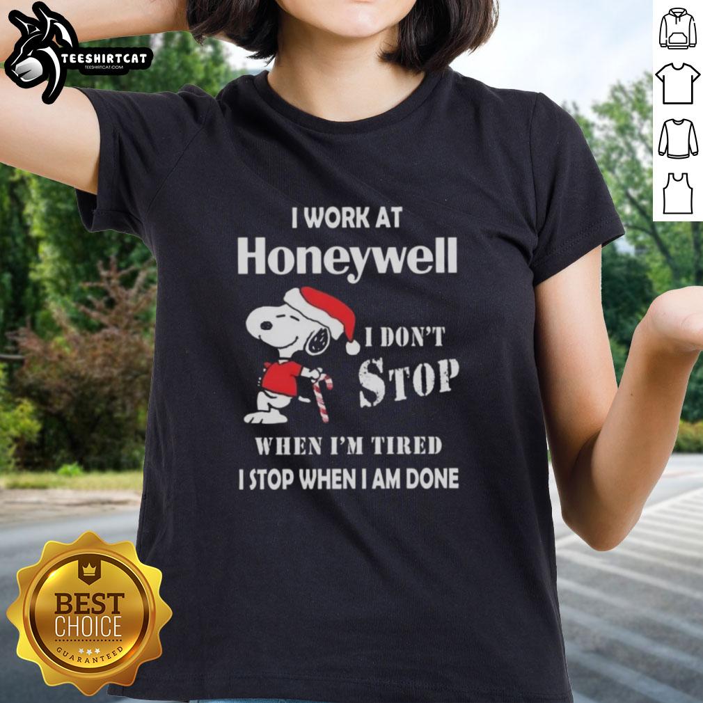 top-snoopy-i-work-at-honeywell-i-dont-stop-when-im-tired-i-stop-when-i-am-done-christmas-ladies-tee Alt Text: Snoopy graphic t-shirt for women: 'I work at Honeywell, I don't stop when I'm tired, I stop when I'm done' Christmas design.