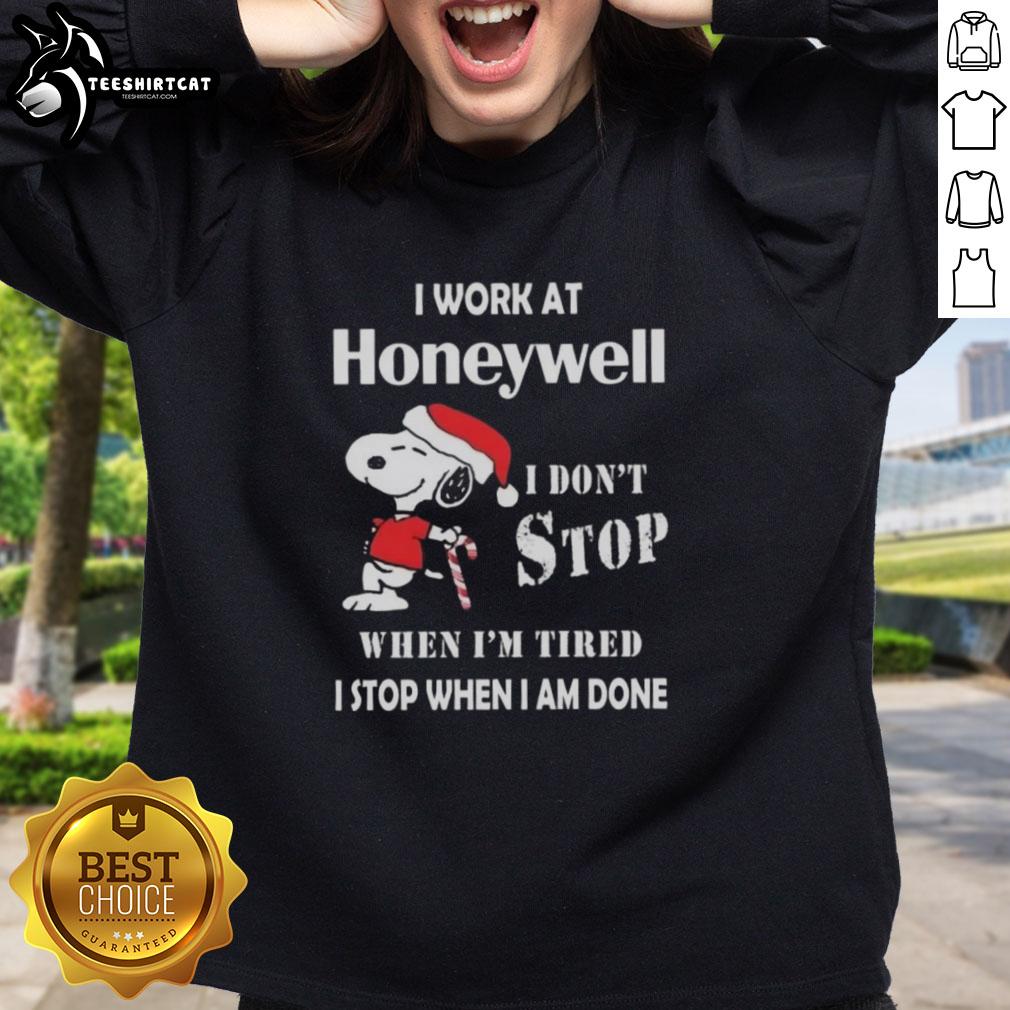 top-snoopy-i-work-at-honeywell-i-dont-stop-when-im-tired-i-stop-when-i-am-done-christmas-sweatshirt Snoopy Christmas sweatshirt featuring 'I work at Honeywell, I don't stop when I'm tired, I stop when I'm done' design.