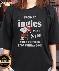 Alt Text: Cute women's Christmas tee featuring Snoopy with I don't stop when I'm tired, I stop when I'm done slogan.
