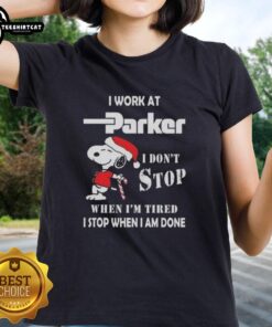 Christmas ladies tee featuring Snoopy with 'I work at Parker Hannifin, I don't stop when I'm tired, I stop when I'm done' text.