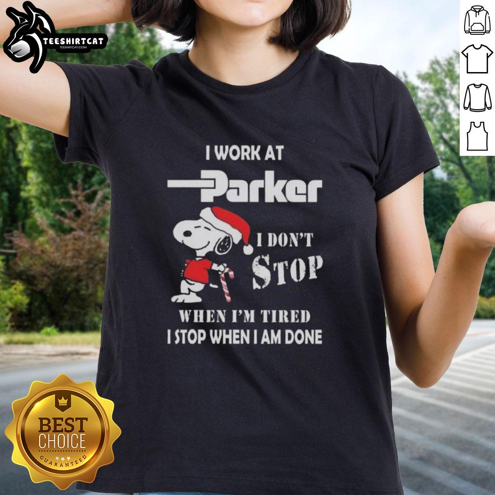 top-snoopy-i-work-at-parker-hannifin-i-dont-stop-when-im-tired-i-stop-when-i-am-done-christmas-ladies-tee Christmas ladies tee featuring Snoopy with 'I work at Parker Hannifin, I don't stop when I'm tired, I stop when I'm done' text.