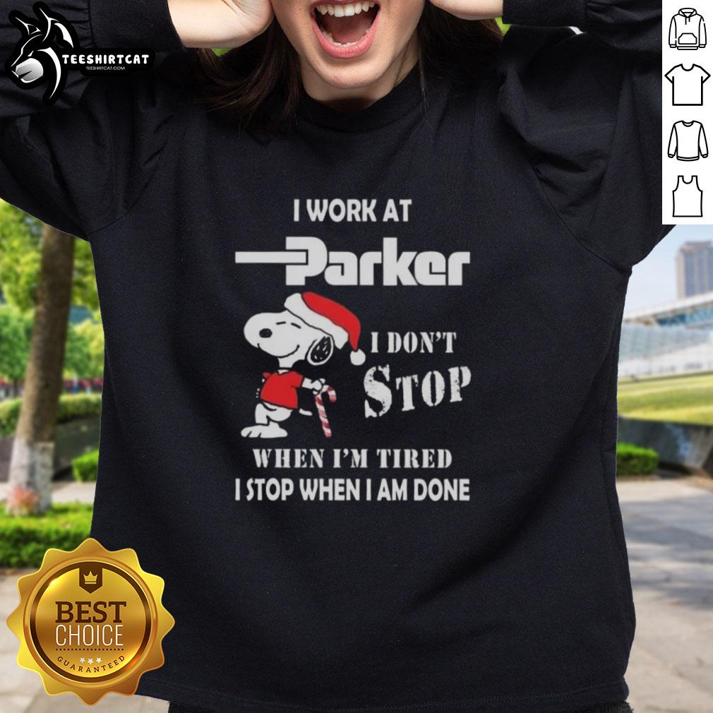 top-snoopy-i-work-at-parker-hannifin-i-dont-stop-when-im-tired-i-stop-when-i-am-done-christmas-sweatshirt Alt Text: Cozy Christmas sweatshirt featuring Snoopy with the phrase I don't stop when I'm tired, I stop when I'm done.