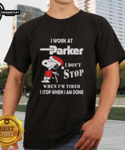 Alt Text: Snoopy Christmas T-Shirt for Parker Hannifin employees: 'I Dont Stop When Im Tired, I Stop When I Am Done' design.