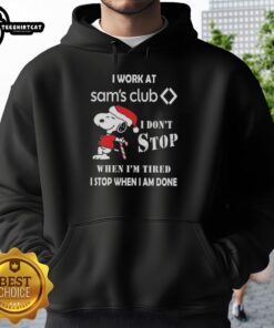 Alt Text: Snoopy Christmas hoodie with 'I Work At Sam's Club, I Don't Stop When I'm Tired, I Stop When I'm Done' slogan.