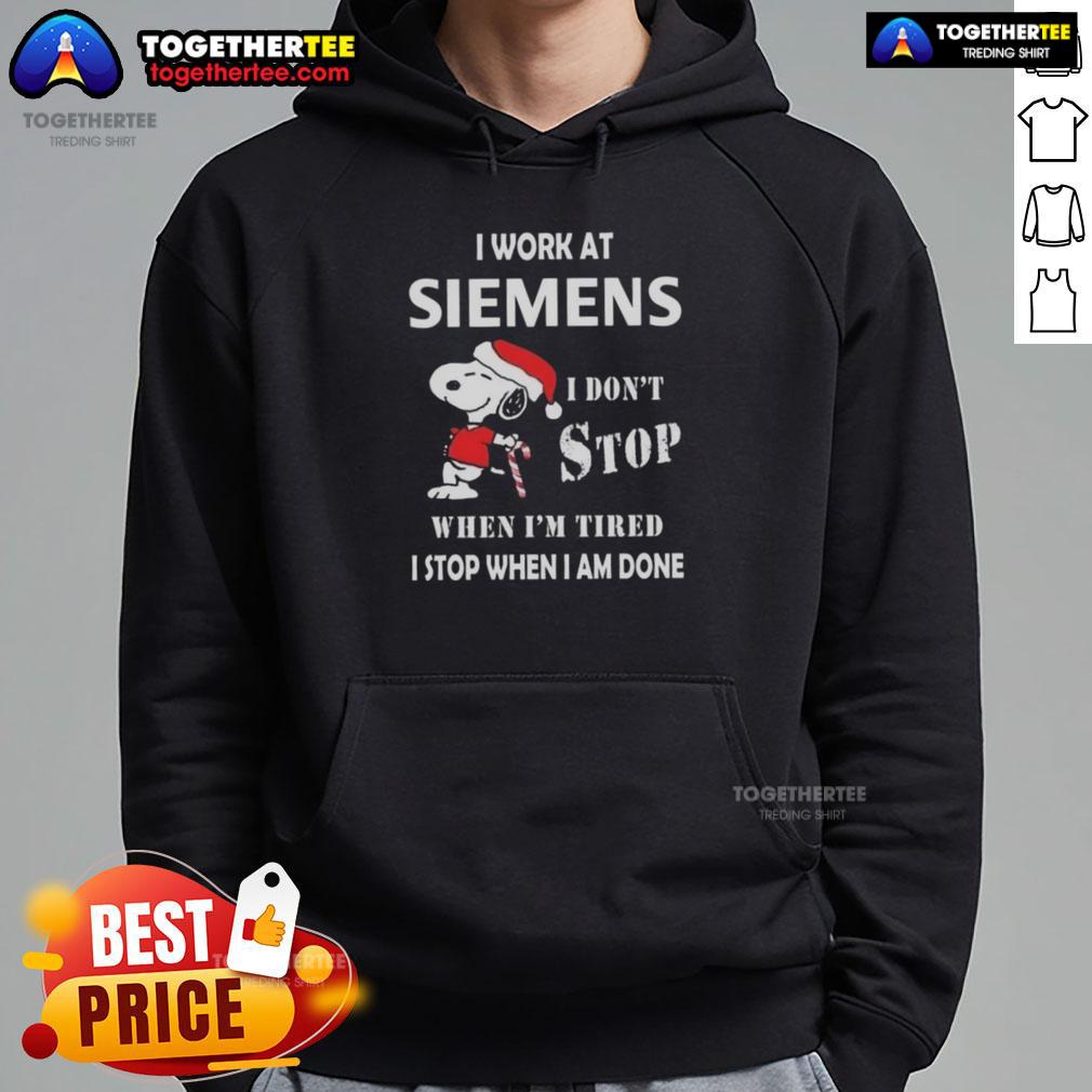 Top Snoopy I Work At Siemens I Don't Stop When I'm Tired I Stop When I Am Done Christmas Hoodie Snoopy Christmas hoodie with 'I work at Siemens, I dont stop when Im tired, I stop when Im done' design.