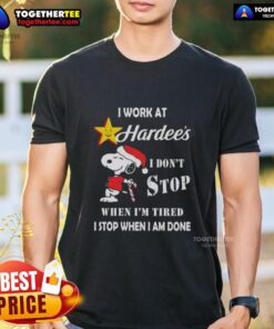 Alt Text: Snoopy Christmas T-Shirt featuring 'I Work At The Hardee's I Dont Stop When Im Tired' design, perfect for holiday wear.