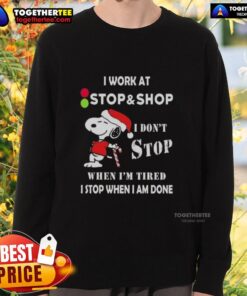Snoopy graphic on a Christmas sweatshirt reading 'I don't stop when I'm tired, I stop when I'm done' at Stop Supermarket.