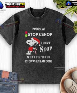 Alt Text: Snoopy graphic tee featuring 'I Work At The Stop Supermarket, I Dont Stop When Im Tired' for Christmas.