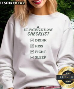 Cozy green sweatshirt featuring a St. Patrick's Day checklist: drink, kiss, fight, sleep, hope perfect for festive celebrations.
