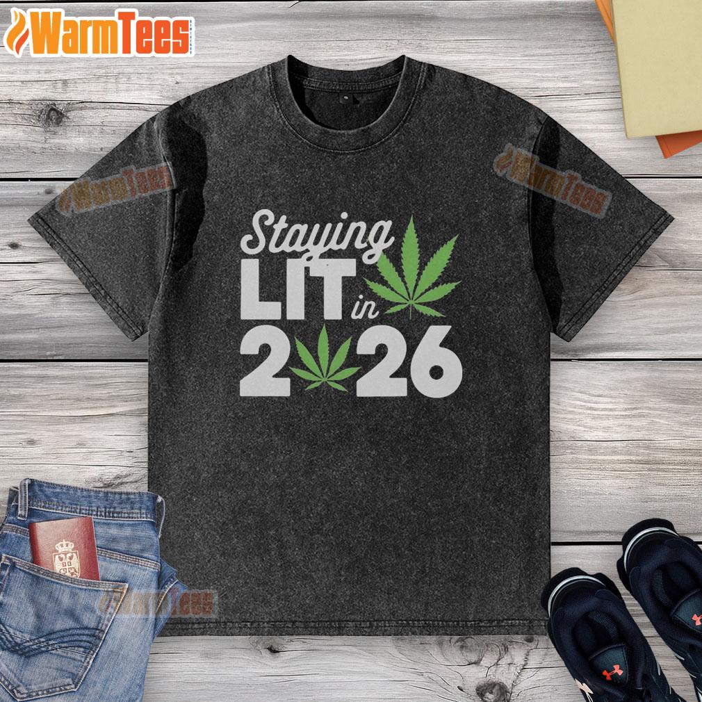 top-staying-lit-in-2026-high-wasted-marijuana-weed-new-years-washed-t-shirt High-waisted marijuana-themed t-shirt for New Year's 2026, featuring 'Staying Lit' design in vibrant colors.