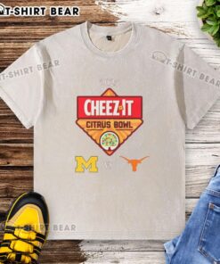 Alt Text: 2025 Citrus Bowl washed t-shirt featuring Texas Longhorns and Michigan Wolverines logos, perfect for fans.