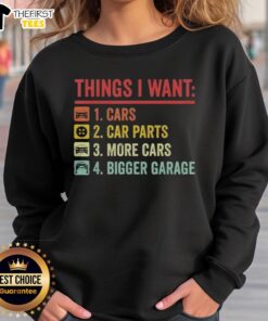 Cozy sweatshirt featuring 'Top Things I Want: Car Parts, More Cars, Bigger Garage,' perfect for car enthusiasts.