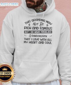 Alt Text: Cozy hoodie featuring the phrase Top This Grandma May Not Be Rich And Famous But I Do Have Priceless Grandchildren