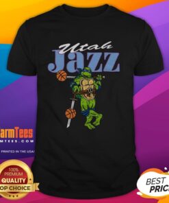 Alt Text: Top TMNT Leonardo X Utah Jazz T-Shirt featuring vibrant graphics of Leonardo in Jazz colors, perfect for fans.
