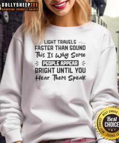 Quote sweatshirt featuring 'Top Travels Light Faster Than Sound' design, perfect for unique fashion statements.