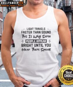 Quote tank top featuring 'Top Travels Light Faster Than Sound' design, perfect for travel enthusiasts and witty fashion lovers.