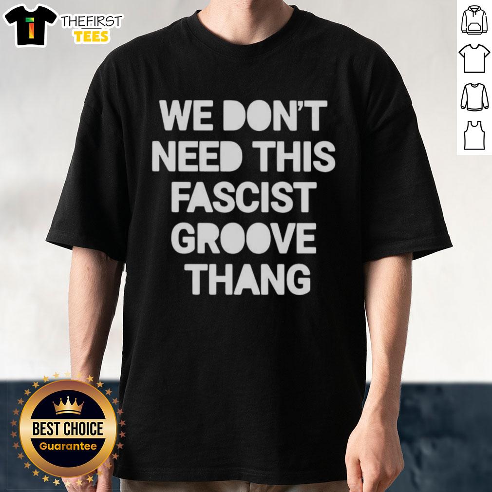 top-we-dont-need-this-fascist-groove-thang-t-shirt-1 Alt Text: Top We Don't Need This Fascist Groove Thang T-Shirt featuring bold graphic design and vibrant colors, perfect for statement wear.