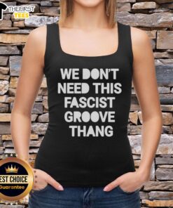Trendy tank top featuring 'We Dont Need This Fascist Groove Thang' slogan, ideal for casual wear and expressing individuality.