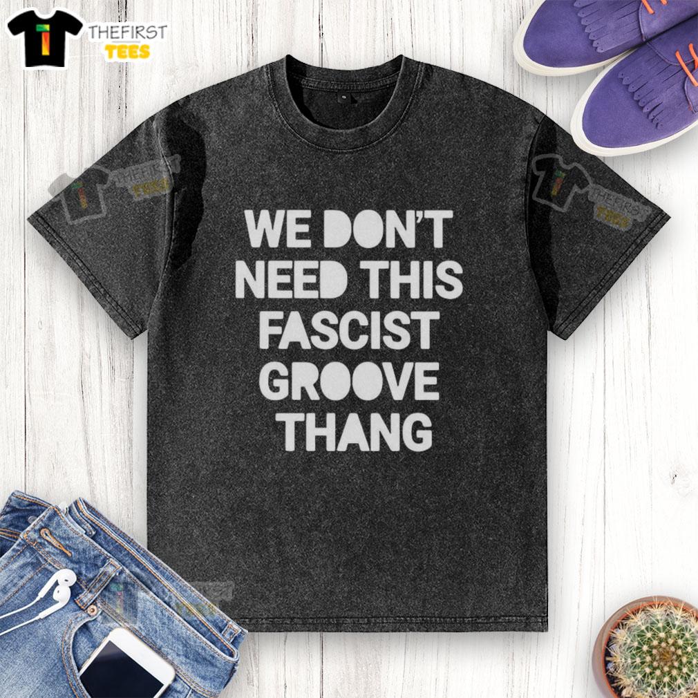 top-we-dont-need-this-fascist-groove-thang-washed-t-shirt Top We Don't Need This Fascist Groove Thang Washed T-Shirt featuring a stylish graphic design for casual wear.