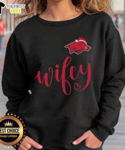 Top Wifey Arkansas Razorbacks sweatshirt with Santa hat for a Merry Christmas celebration, perfect gift for fans.