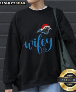 Cozy Carolina Panthers sweatshirt with Santa hat design, perfect for Christmas cheer and showing team spirit. Merry Christmas!