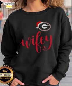 Top Wifey Georgia Bulldogs sweatshirt with Santa hat, perfect for a Merry Christmas celebration for fans.