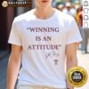 Alt Text: Top Winning Is An Attitude signature t-shirt featuring motivational design, perfect for inspiring confidence and positivity.