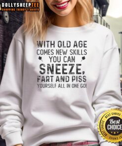 Humorous sweatshirt featuring a quote about aging: 'With old age comes new skills' in a fun design.