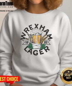 Top Wrexham Lager 1882 mug on a cozy sweatshirt, perfect for fans of Wrexham's iconic beer brand.