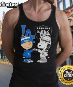 Awesome Charlie Brown fist bump with Snoopy, showcasing Los Angeles city sports Dodgers & Raiders tank top design.
