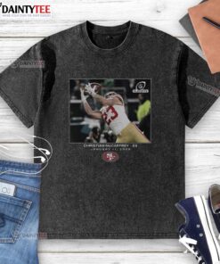 Awesome Christian McCaffrey San Francisco 49ers NFL Wild Card Washed T-Shirt featuring vibrant team colors and design.