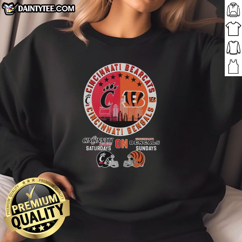 awesome-cincinnati-bearcats-on-saturdays-and-cincinnati-bengals-on-sundays-helmet-logo-mashup-sweatshirt Awesome Cincinnati Bearcats and Bengals helmet logo mashup sweatshirt showcasing team spirit and style.