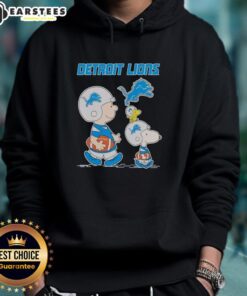 Awesome Detroit Lions X Snoopy and Charlie Brown hoodie featuring vibrant team colors and playful cartoon graphics.