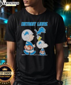 Awesome Detroit Lions X Snoopy and Charlie Brown T-Shirt featuring playful designs for fans of both franchises.