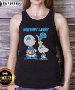 Alt Text: Awesome Detroit Lions X Snoopy and Charlie Brown tank top featuring vibrant graphics and team colors for fans.